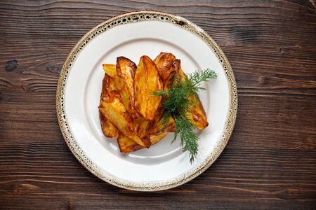 Potato wedges sliced. catering menuの写真素材