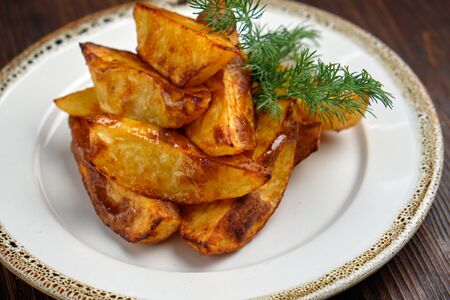 Potato wedges sliced. catering menuの写真素材
