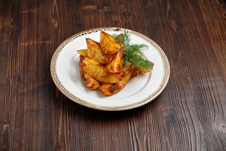 Potato wedges sliced. catering menuの写真素材