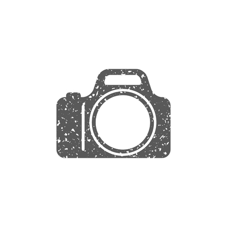 Camera icon in grunge texture. Vintage style vector illustration.のイラスト素材