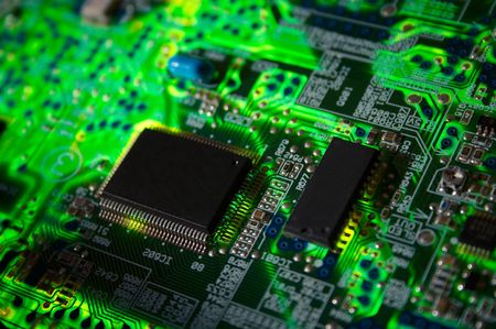 Green electronic board illuminated from bottomの写真素材