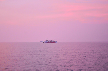 Sunset over the Thailand Sea and boat, Samui.の写真素材