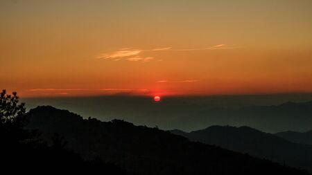 Beautiful sunrise over mountain in northern of Thailandの写真素材