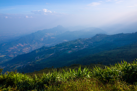 Meadow and tropical mountain landscape viewの写真素材