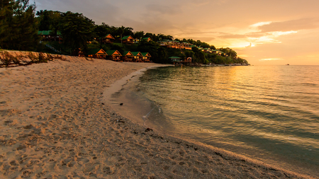 sunset over beautiful sea and beach any sky of andaman thailandの写真素材