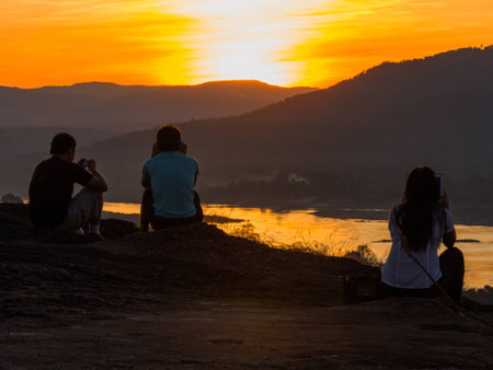 Silhouette sunrise and golden sky with riverの写真素材