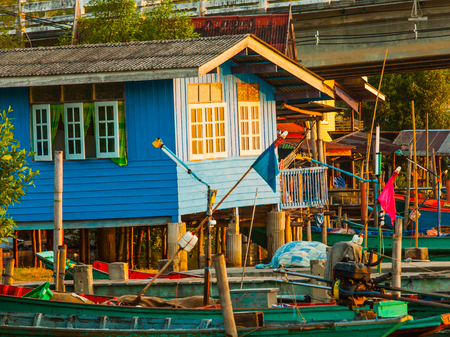 Morning sun light shine on fisherman homeの写真素材