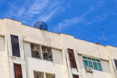 Old condo or office on blue skyの写真素材