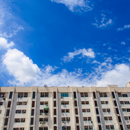 Old condo or office on blue skyの写真素材