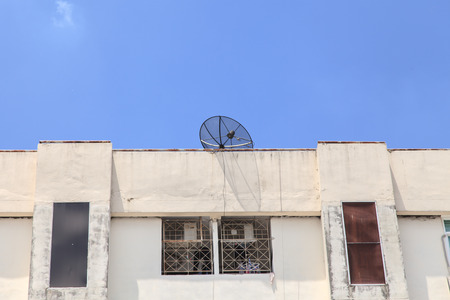 Old condo or office on blue skyの写真素材