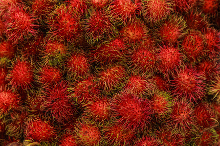 Rambutan in shelf of fresh market.の写真素材