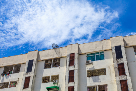 Old condo or office on blue skyの写真素材