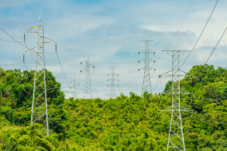 electrical high voltage transmission line on mountainの写真素材