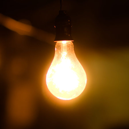 Old light bulb glowing