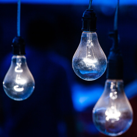 Old light bulb. Blue cold filterの写真素材