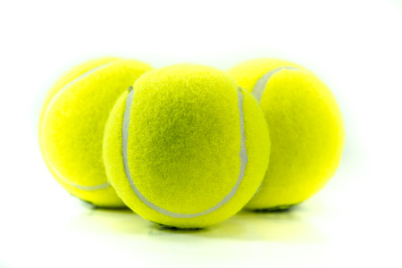 Tennis balls on white backgroundの写真素材