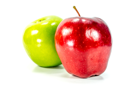Green and red apple on white backgroundの写真素材