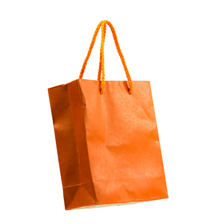 Red shopping paper bag on white backgroundの写真素材