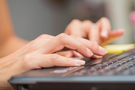 Woman working from home using computer PCの写真素材
