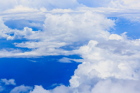 Blue sky and clouds. view from planeの写真素材