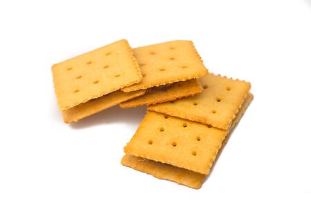 Cracker with pineapple jam on white backgroundの写真素材
