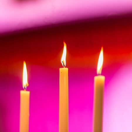 Candle light glowing in wedding ceremonyの写真素材