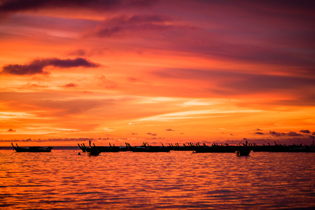Beautiful fantastic sunse sky background on tropical sea and islandの写真素材