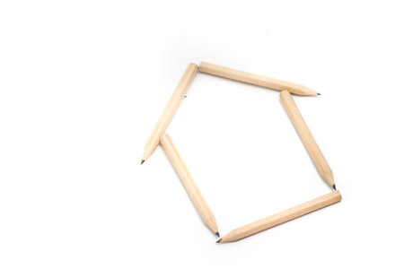 House shape made from pencil on white backgroundの写真素材