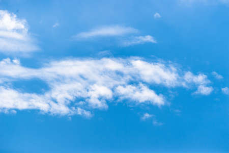 Blue sky and clouds backgroundの写真素材