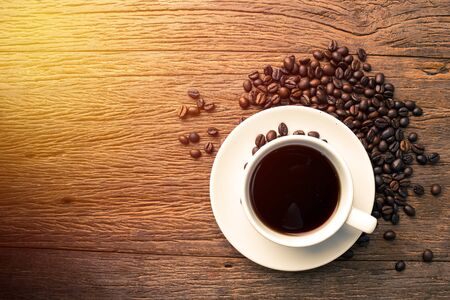 Top view hot coffee on grunge wood tableの写真素材