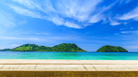 Wood table top on tropical ocean backgroundの写真素材
