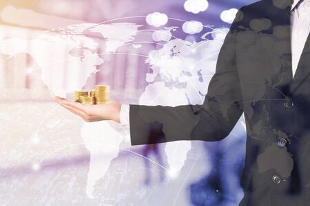Double exposure business man on trading investment graph and financial city background.の写真素材