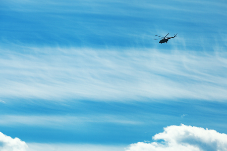Helicopter above the cloudsの写真素材