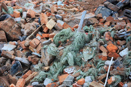 A pile of construction debris is broken brick and concrete.の写真素材
