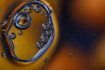 Abstract image with colorful circles and shapeless bodies on a colored background.の写真素材