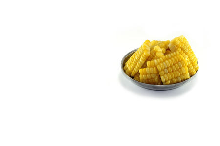 sweet corn sliced in bowlの写真素材