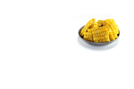 sweet corn sliced in bowlの写真素材
