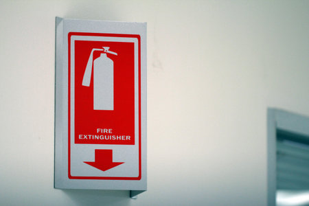 photo sign fire extinguisher. Texture background banner red silhouette fire extinguisher standing on...
