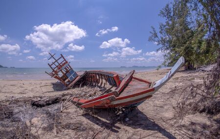 Storm damage. Fishing boat are damaged. Boat collapsed.の写真素材