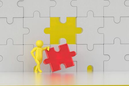 The character is wearing the last piece of the jigsaw puzzle to complete the mission. Includes selection path of floor and background.の写真素材