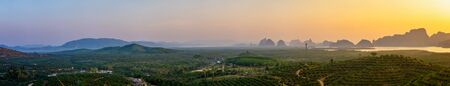 Panorama sunrise at the mountain and sea - Samed Nang Nee, Phang Nga Province, Thailandの写真素材