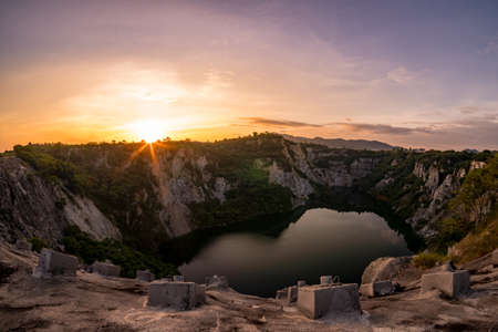 Sunrise at the Grand Canyon in Chonburi, Thailand.
The well is surrounded by limestone rocks.の写真素材