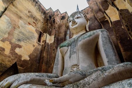 The Buddha image Wat Sri Chum temple in Sukhothai,Thailand.の写真素材
