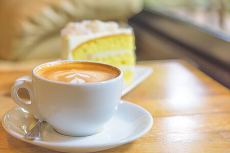 A cup of  hot coffee and cake.の写真素材