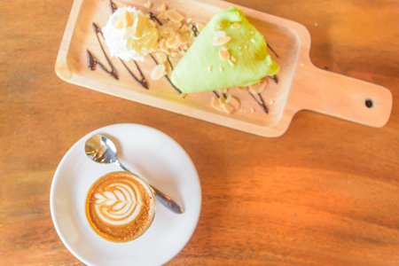 A cup of  hot coffee and cake.の写真素材