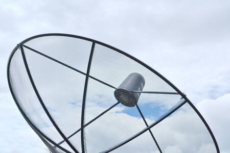 Satellite dish in morning sky の写真素材