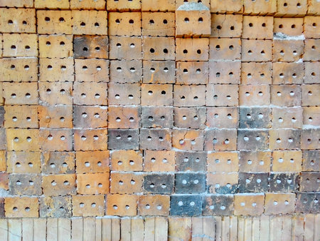 Stack of clay bricks texture background.