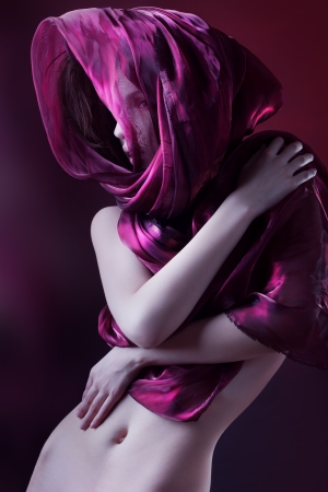 gorgeous woman with purple color scarfの写真素材