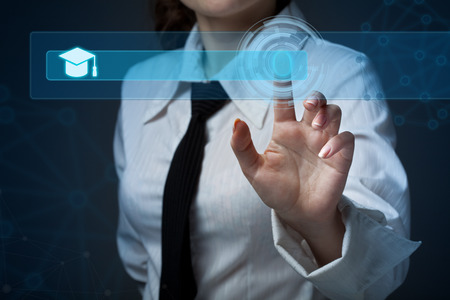 Young business woman pressing a different button collectionの写真素材
