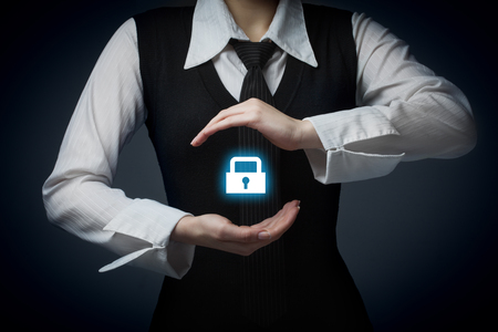 Security services and protection concept. Login, sign in concepts. Businessman offer padlock, symbol of security.の写真素材